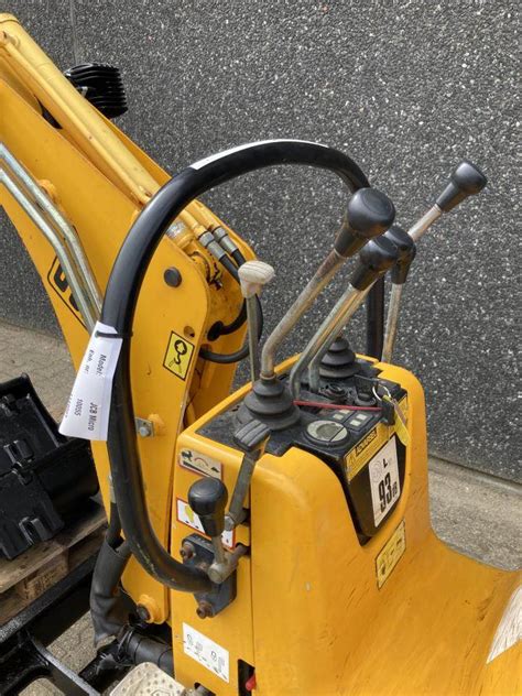 jcb micro mini excavator tracking uneven|jcb track adjustment.